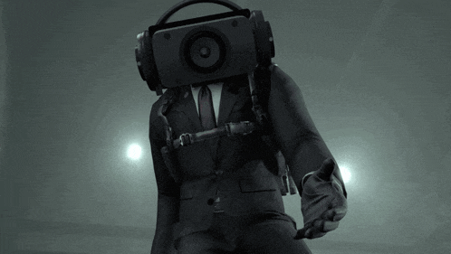 a man in a suit and tie with a camera on his head