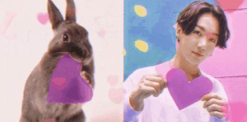 a rabbit holding a purple heart next to a boy holding a pink heart