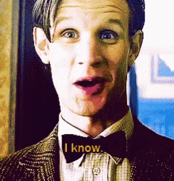 a man wearing a bow tie says " i know "