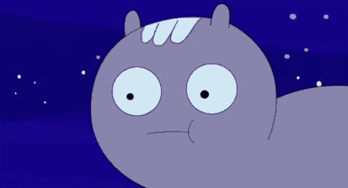 a close up of a cartoon character with big eyes and a purple head .