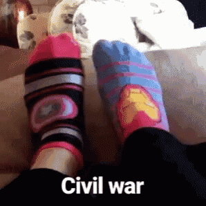a person wearing a pair of civil war socks on their feet