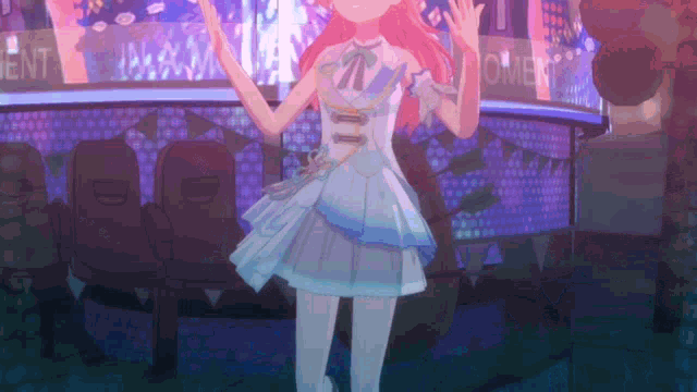 a girl in a white and blue dress is dancing in front of a sign that says moment