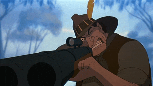 a man in a cowboy hat is pointing a rifle