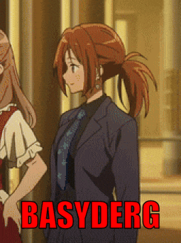 a woman in a suit and tie is standing next to another woman with the name basyderg written in red