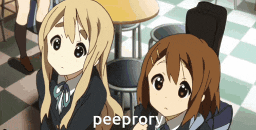 two anime girls are sitting next to each other and the word peeprory is on the screen