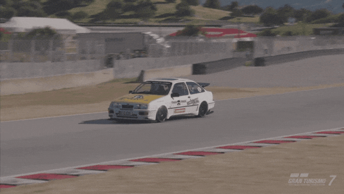a video game called gran turismo 7 is being played on a computer