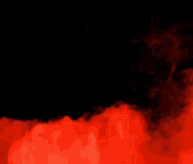 red smoke is coming out of a hole on a black background .