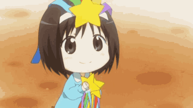 a little girl with a star on her head holding a star wand