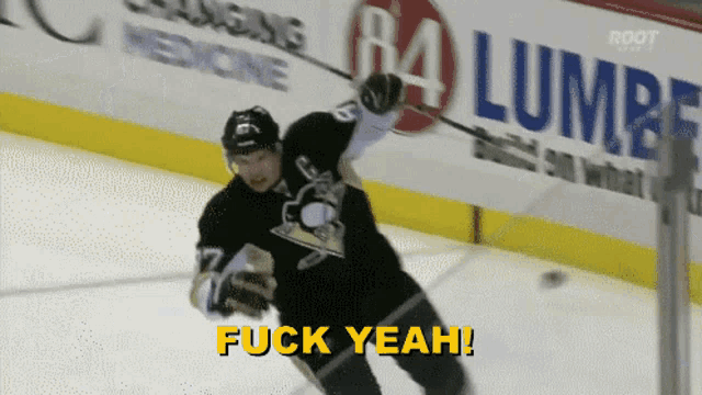 a hockey player says fuck yeah in front of a sign for 64 lumber