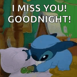 a cartoon character is laying in bed with the words `` i miss you ! goodnight '' written on it .