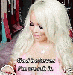 a woman with blonde hair and a pink bra says god believes i 'm worth it