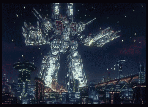 a giant robot stands in front of a city at night