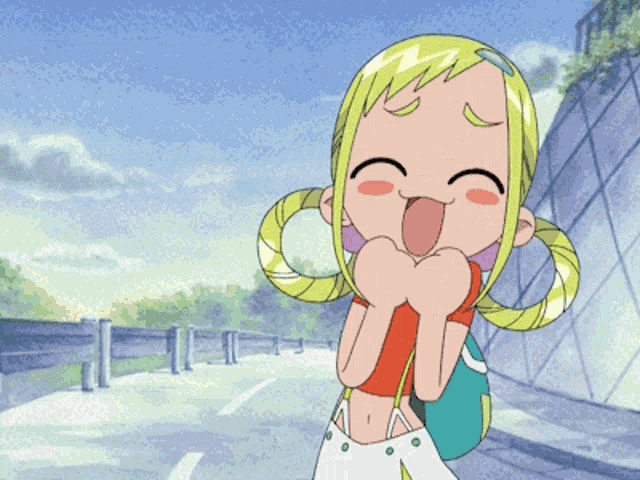 a cartoon girl with blonde hair is smiling and making a face