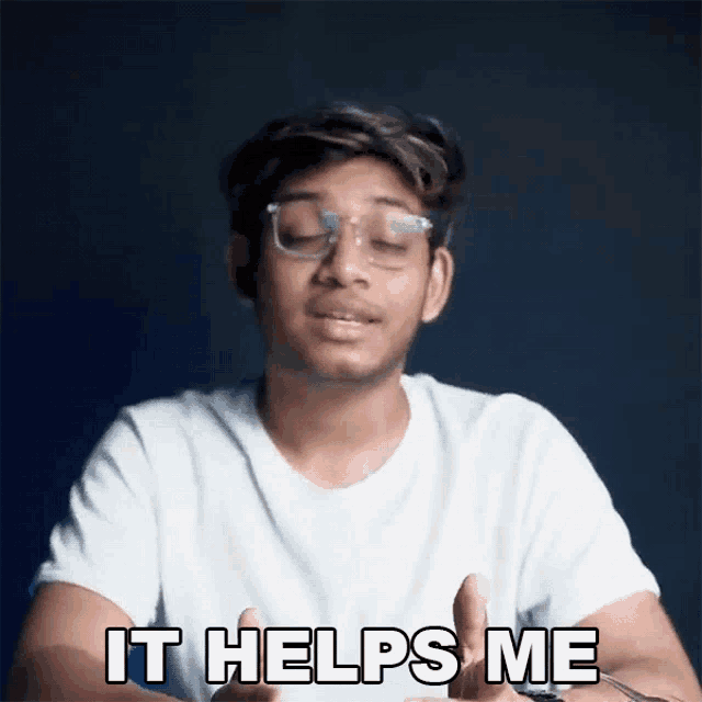 a man wearing glasses and a white shirt says it helps me