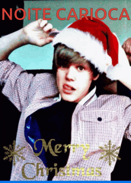 a picture of a boy wearing a santa hat with the words merry christmas on it