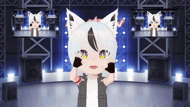 a girl with white hair and black ears is standing on a stage with two monitors behind her