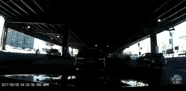 a video of a car going under a bridge with the words " do n't rewind just keep watching "