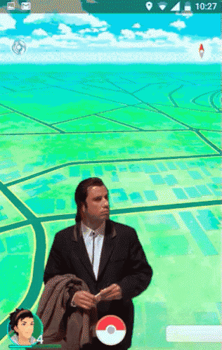 a man in a suit and tie is holding a pokeball in a video game called pokemon go