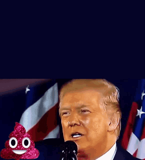 donald trump is giving a speech in front of an american flag with a pink poop emoji behind him
