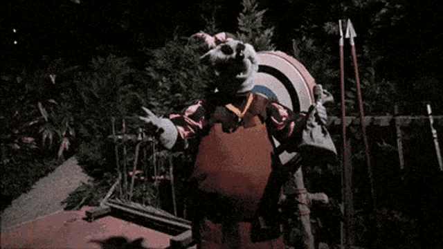 a cartoon character is standing in front of a large target