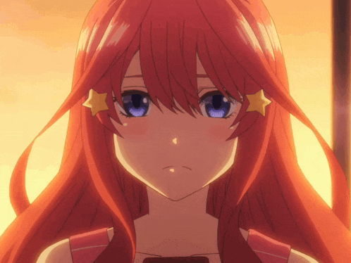 a girl with red hair and blue eyes has a star on her forehead