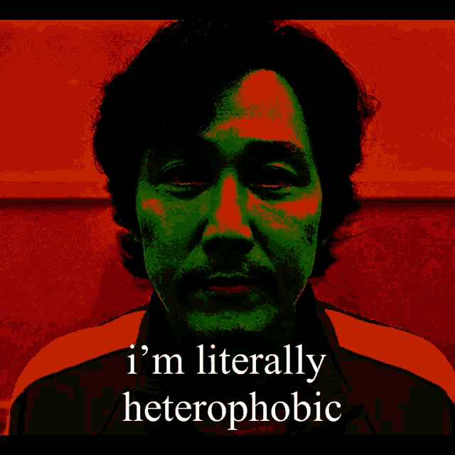 a picture of a man with the words " i 'm literally heterophobic " on the bottom