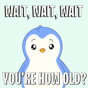 a penguin with the words wait wait wait you 're how old written on it