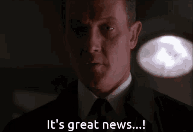 a man in a suit and tie is saying " it 's great news "