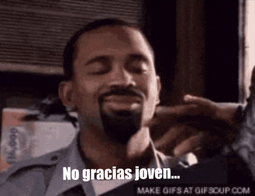 a man with a beard says no gracias joven on a gif