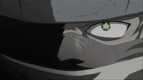 a close up of a person 's face with a green star in his eye