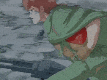 a man with red hair is holding a gun in his hand
