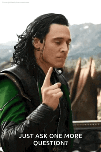 a man in a green and black jacket is making a gesture with his finger and says just ask one more question .