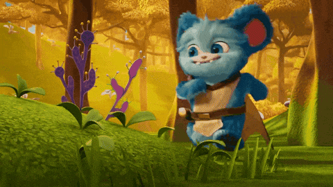 a blue teddy bear is standing in the grass