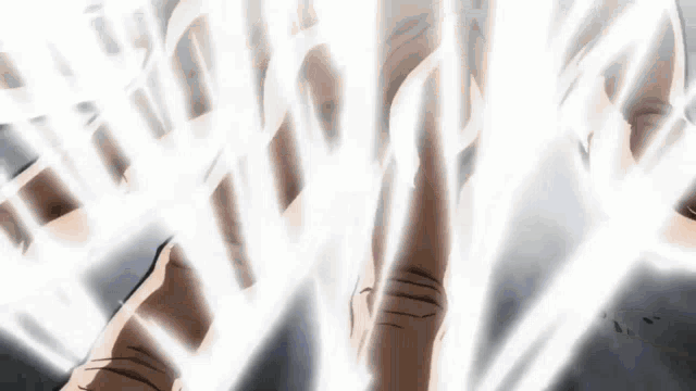 a close up of a person 's arm with a white light coming out of it .