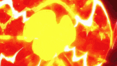 a close up of a yellow and red explosion with a red background .