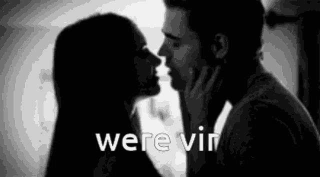a man and a woman are kissing in a black and white photo with the words `` were vin '' above them .
