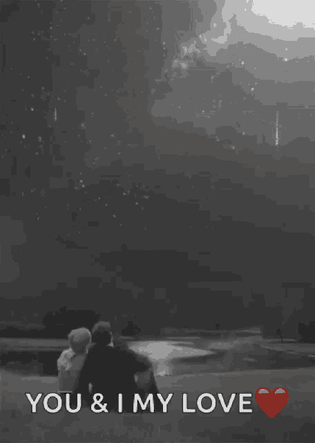 a couple sitting under a starry sky with the words you and i my love
