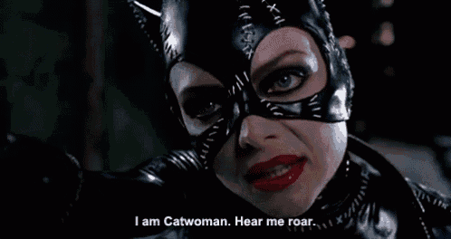a woman in a catwoman costume says " i am catwoman "