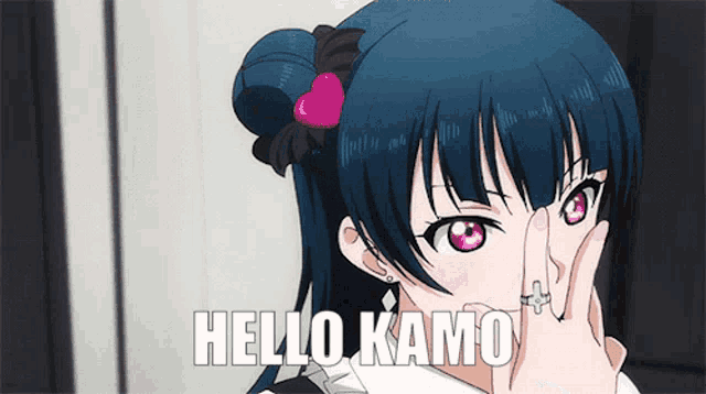a girl is covering her face with her hand and the words hello kamo are below her