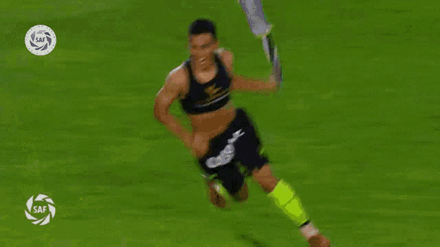a soccer player wearing a shirt that says cortesur