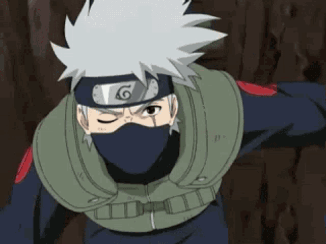a close up of a naruto character wearing a mask .