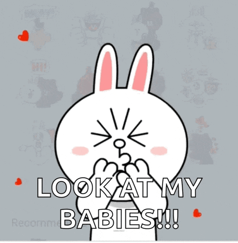a cartoon bunny says look at my babies in front of hearts