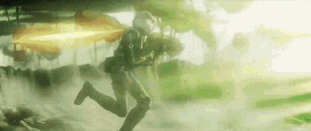 a man in a black suit is running through a foggy field .