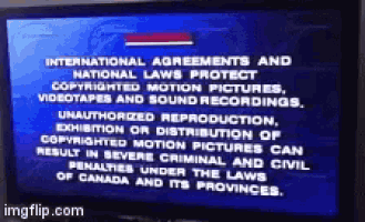 a tv screen that says international agreements and national laws protect copyrighted motion pictures