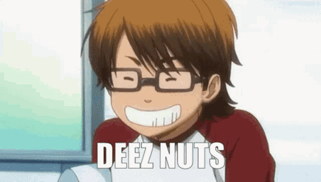 a boy wearing glasses is smiling with the words `` deez nuts '' written on his face .
