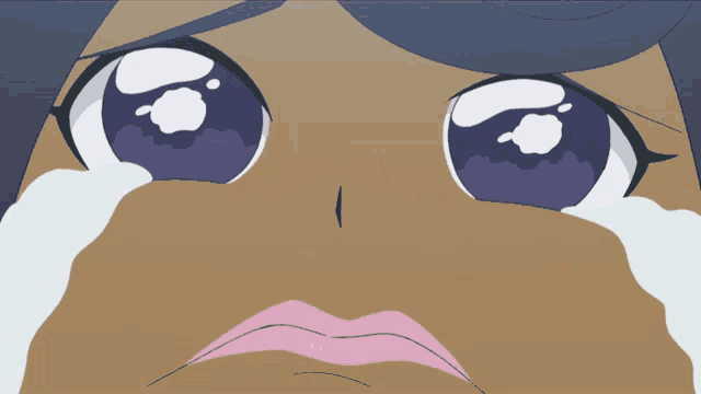 a close up of a girl 's face with tears running down her face
