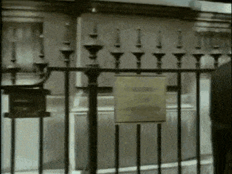 a metal fence with a sign on it that says ' closed ' on it