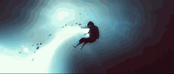 a man is flying through the air in the dark .