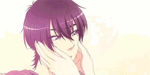 a couple of anime characters are kissing each other on the cheek .