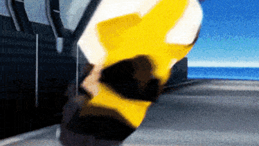 a blurry picture of a person in a yellow and black outfit